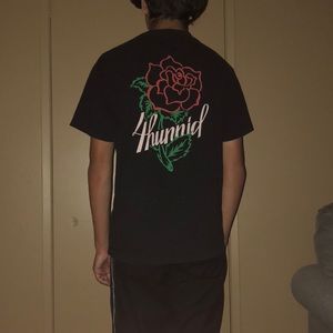 This is a 4hunnid t shirt by yg